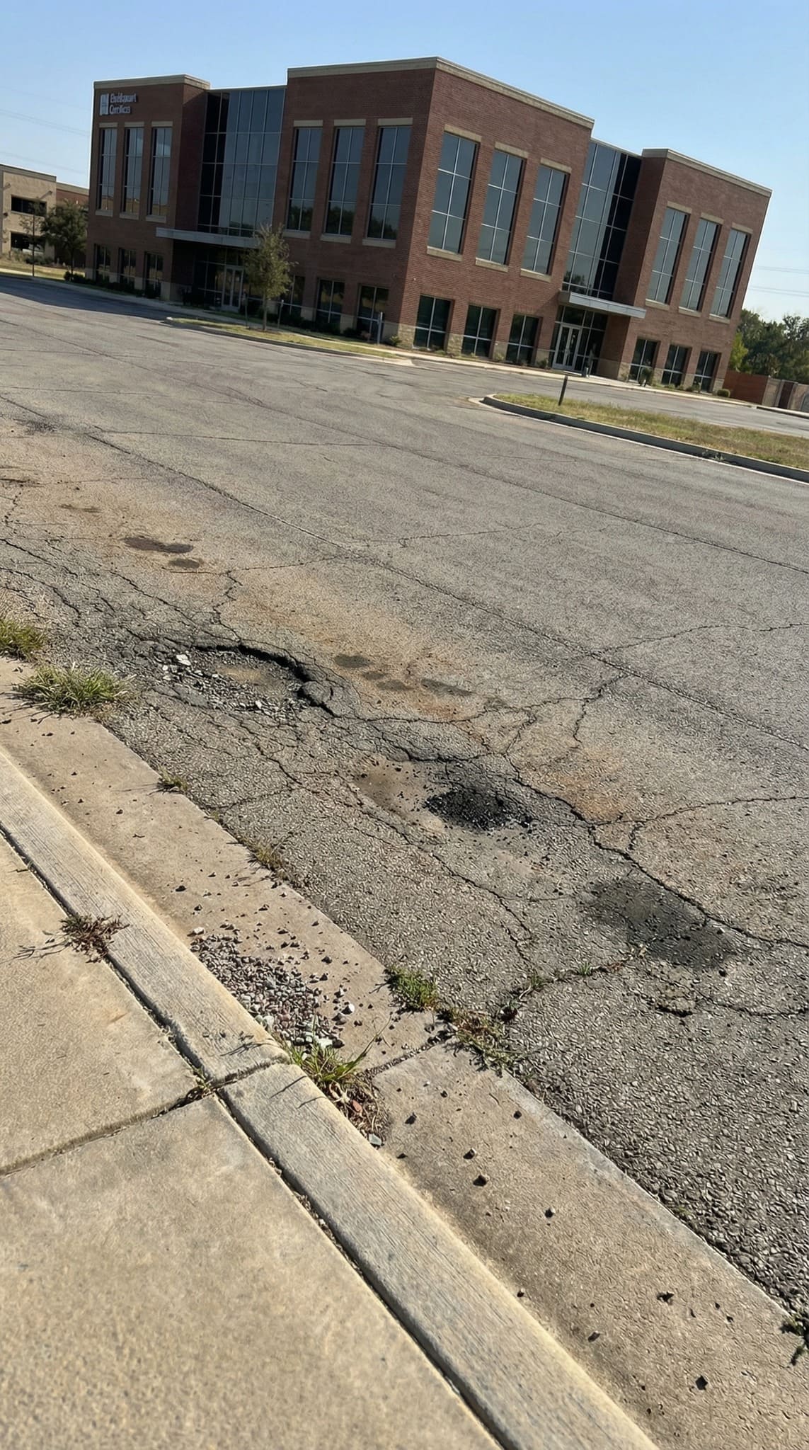 Office parking lot before resurfacing