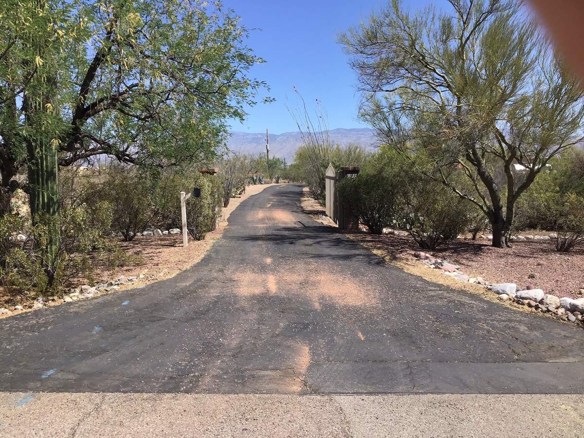 Fresh chip seal road through arid landscape