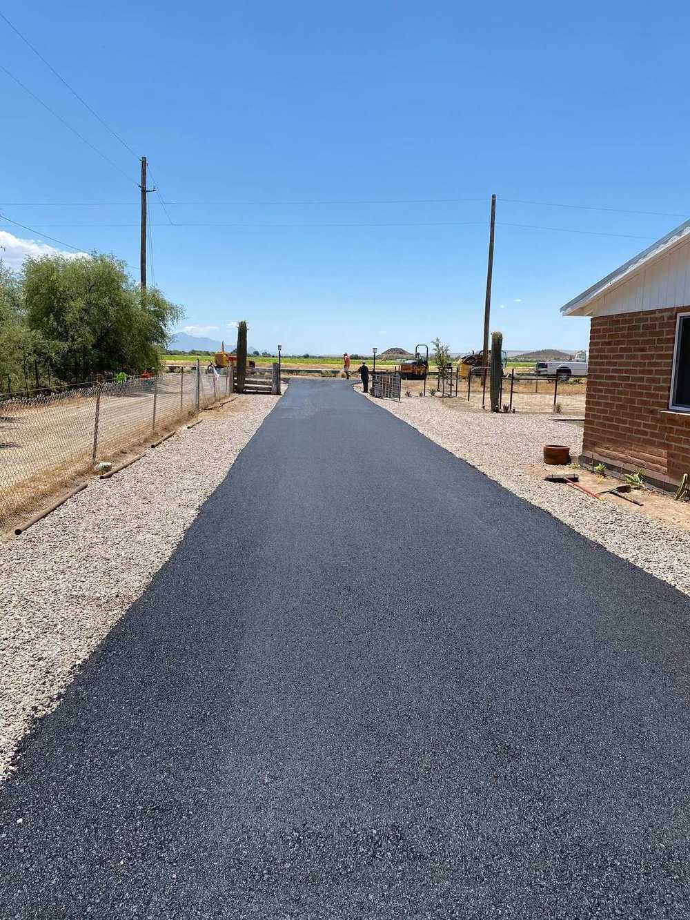 Asphalt paving on rural road in New Mexico